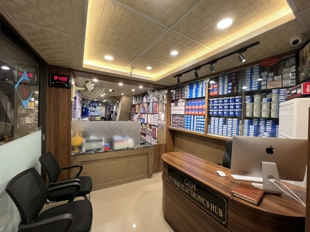 Inside the Vicky Brothers shop, shelves stocked with branded part boxes